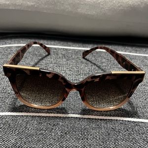 Topfoxx sunglasses. Purple and brown tortoise. Gold accents.
